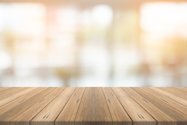 Empty wood table top on blurred background