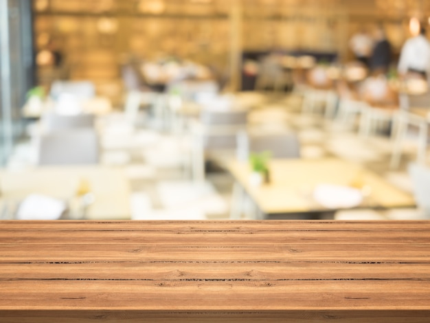 Empty wood table top on blurred background 