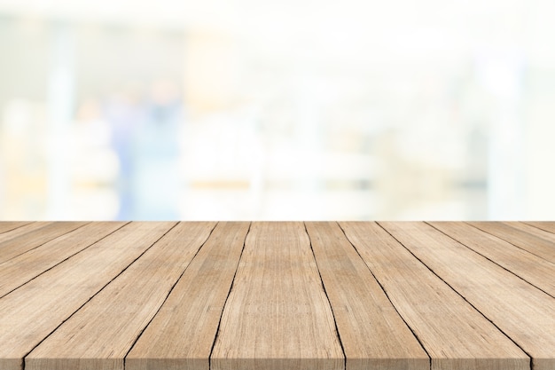 Empty wood table top on white blurred background