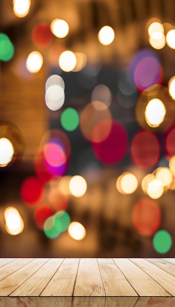 Photo empty wood table top with blur christmas tree with bokeh light background for mockup