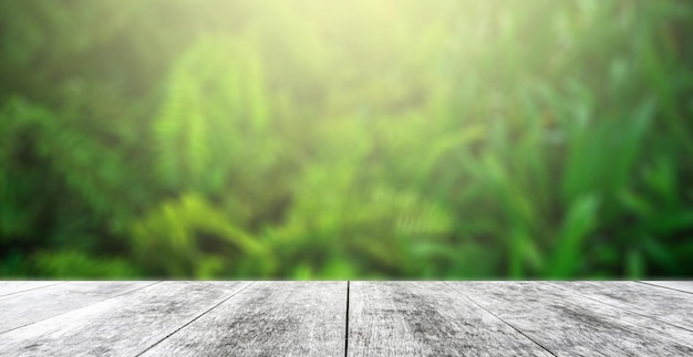 Empty of wood table top with blurred bokeh abstract background