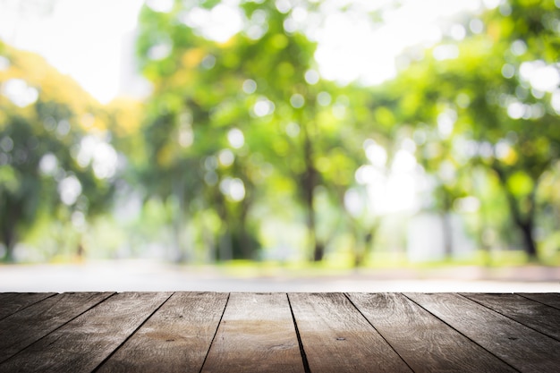 empty wooden on blurred nature backdrop. Wood table top.