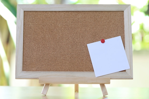 Empty wooden board and note paper.