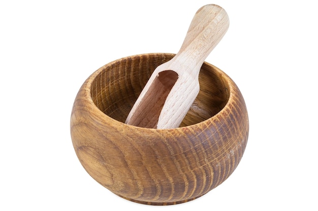 Empty wooden bowl with scoop