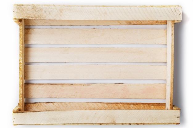 Empty Wooden box for vegetables and fruits on a white background.