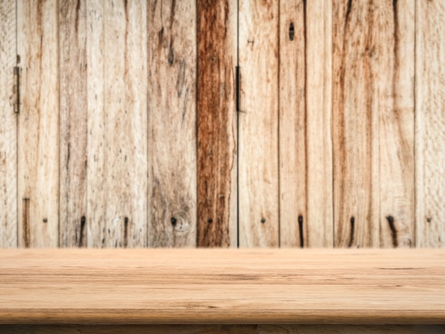 Empty wooden counter top with grunge wood background