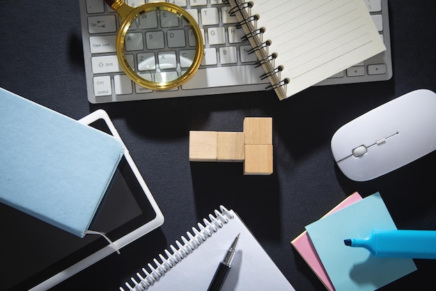 Empty wooden cubes and business objects