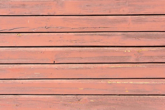 Empty wooden surface Background of multicolored horizontal and vertical boards Old vintage wooden door Empty space for text or design