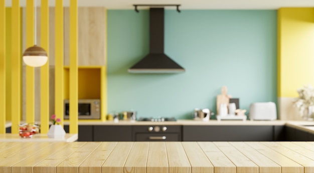 Empty wooden table on blurred kitchen