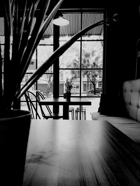 Empty wooden table in building