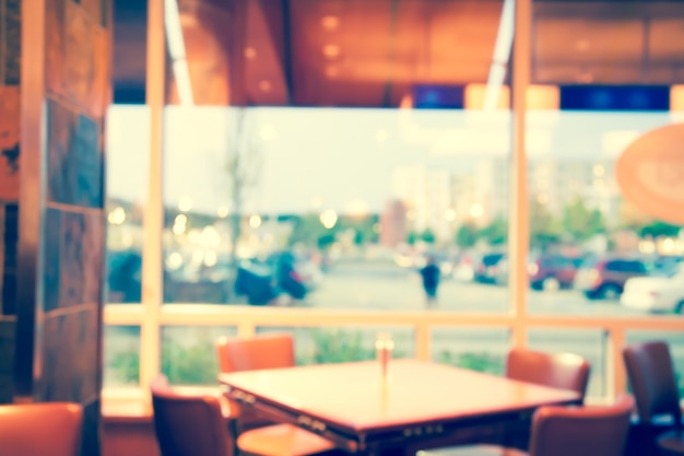 empty wooden table and chairs in cafe restaurant.