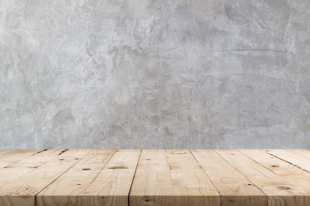Photo empty wooden table and  concrete  wall texture and background