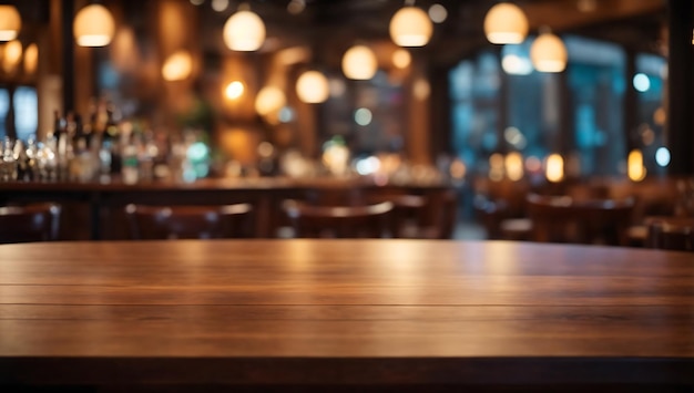 Empty wooden table in front of abstract blurred background of bar or pub