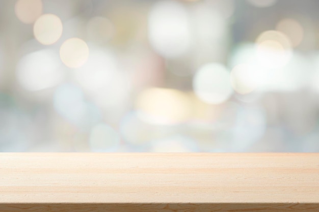 Photo empty wooden table for present product on bokeh blur background image