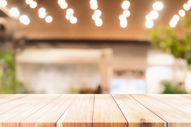 Empty wooden table for present product.