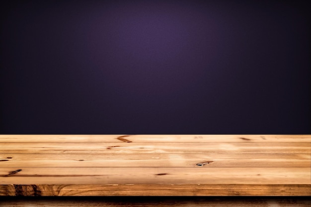 Photo empty wooden table for product placement or montage with focus to the table top gradient background