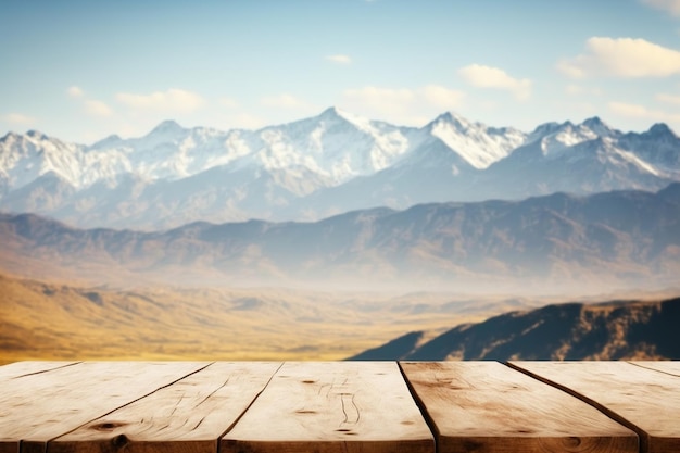 Empty wooden table surface with copy space mountains background