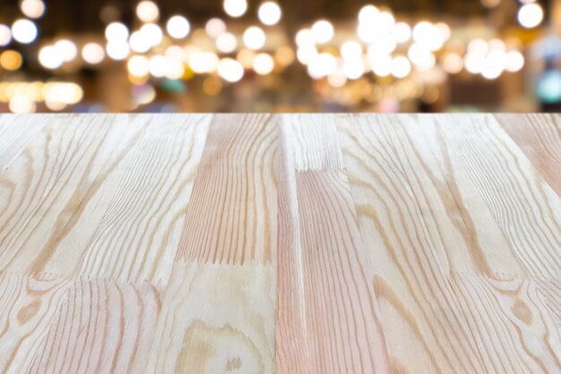 Empty wooden table on top over blur background, can be used mock up