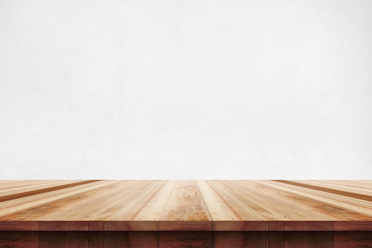 Photo empty wooden table top isolated on white background used for display or montage your products