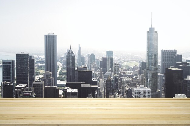 Photo empty wooden table top with beautiful chicago skyscrapers at daytime on background mock up