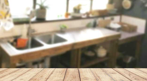 Empty wooden table with blurred vintage kitchen on background