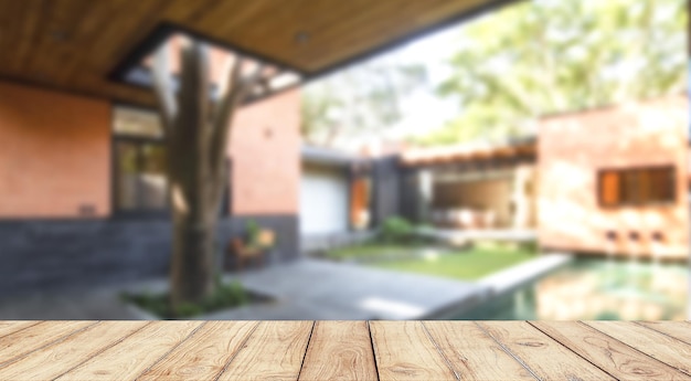 Empty wooden table with blurred vintage kitchen on background