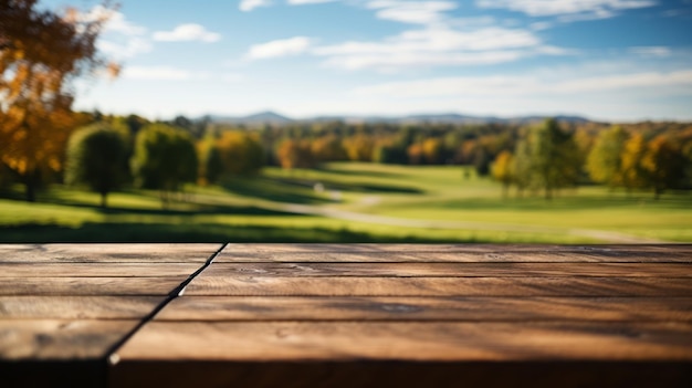 Empty wooden table with a serene meadow and trees