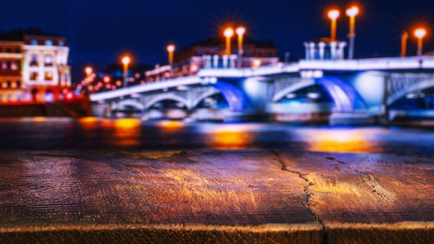 Empty Wooden Table with a View of Evening City