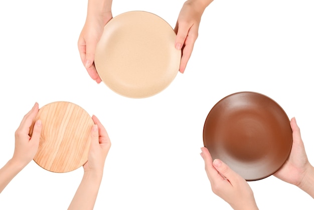 Empty wooden tray in woman hands isolated on white background.