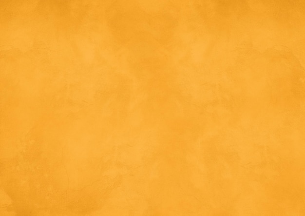 Empty yellow gold concrete wall background