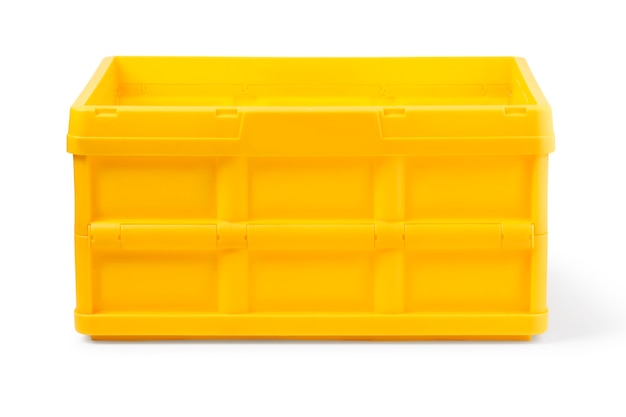 Empty yellow plastic crate isolated over white background with clipping path