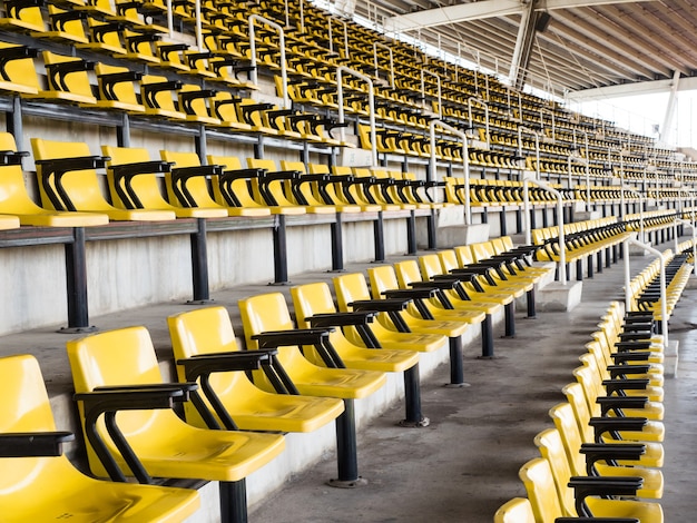 Empty yellow seats in stadium