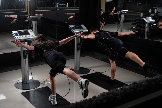 EMS group training for two men and women in the gym