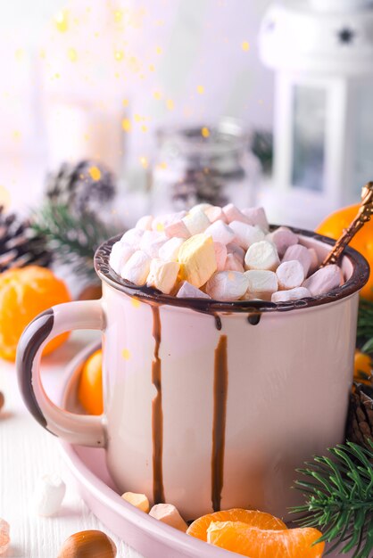 Enamel cup of hot cocoa with mini marshmallows