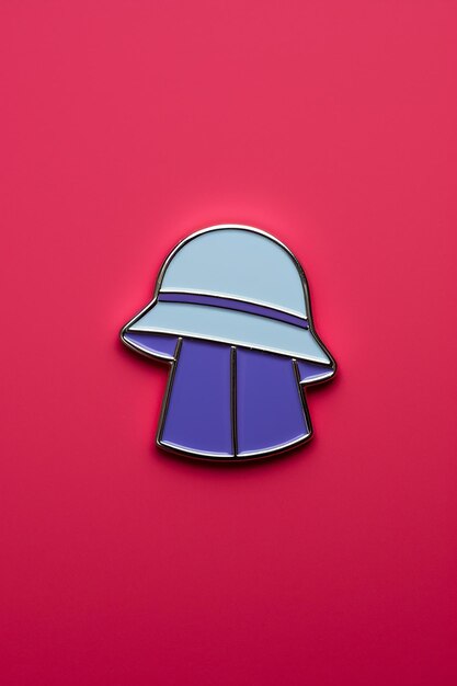 Photo enamel pin on a plain color background