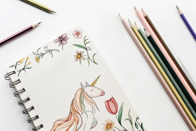 Photo enchanted scribbles a magical unicornthemed notebook generative ai