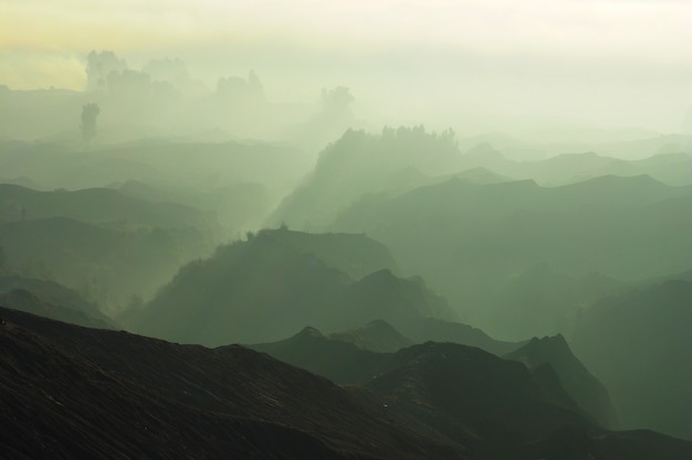 Enchanting View of Bromo Landscape in a beautiful foggy sunrise