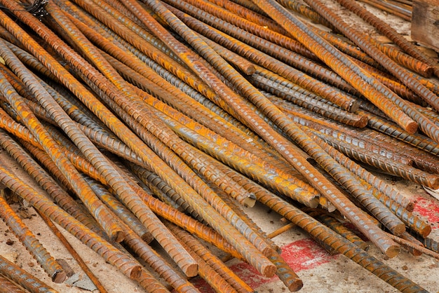 Photo end of rustic steel rods at construction site