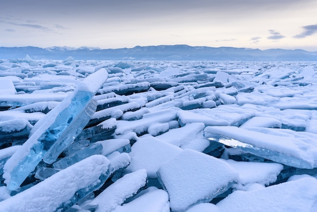 Photo endless hummock field on the frozen lake baikal