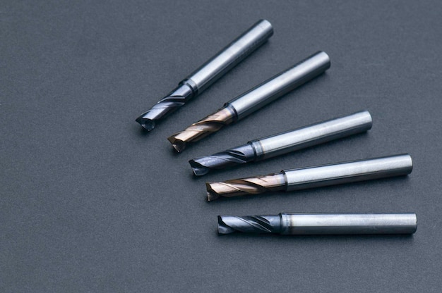 Endmill set cutting tools special spiral right hand material Carbide and high speed steel coating Titanium nitride Used for metalwork isolated on black background