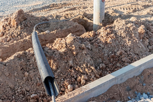 The ends of the electrical cable in the trench. electrical\
cable installation. cable ends.