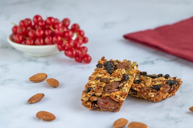 Energy bars of oatmeal, almonds, sunflower seeds, raisins and honey.