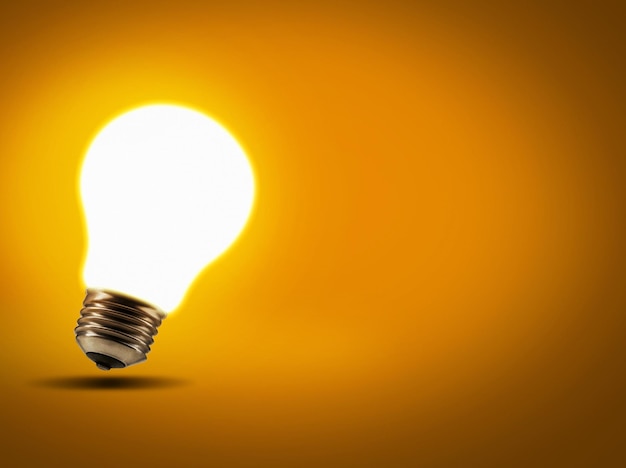 Energy inspiration and lightbulb with a glow innovation and science against studio background light knowledge or enlightenment with ideas growth and development with solution and problem solving