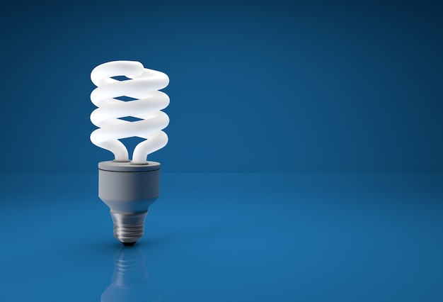 Energy saving bulb on blue background with place for copy text.