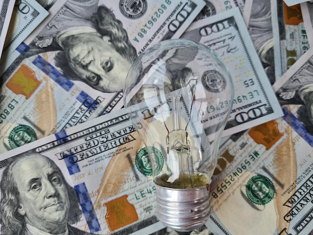 Energy saving lamps or new idea on financial income on dollars banknotes