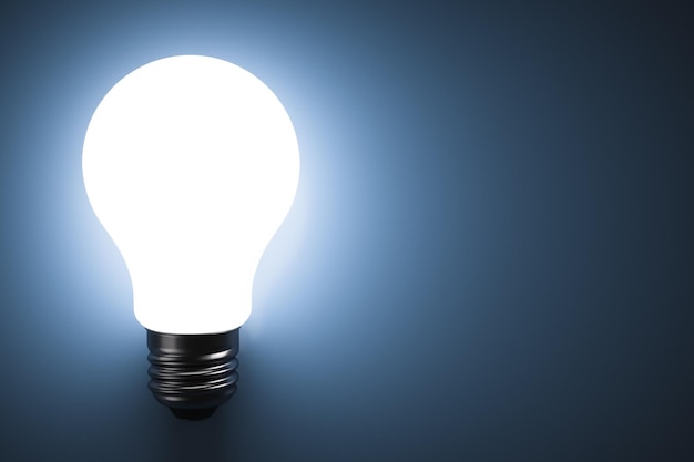 Photo energy saving light bulb glows copy space