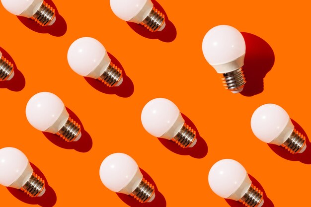 energy saving light bulbs on orange background