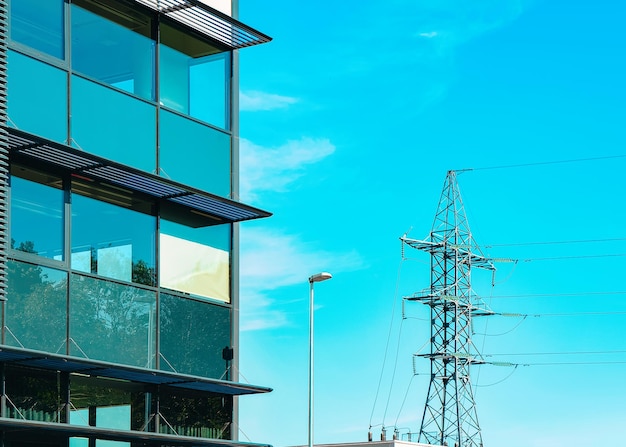 Energy transmission line and modern office building  in the new business quarter