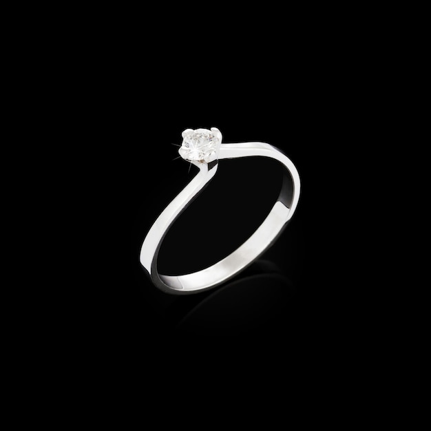 Photo engagement diamond ring on black background