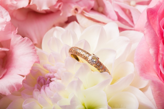 Engagement ring on natural romantic background